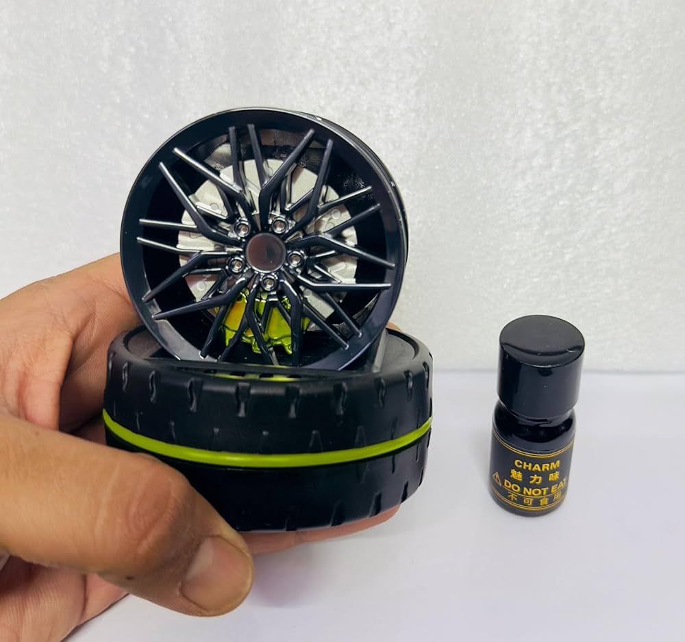 Solar Rotating Car Dashboard Air Freshener/Perfume Diffuser | Metal Body & Alloy Wheel Hub Design with Perfume Liquid for Car Interior Decoration Accessories